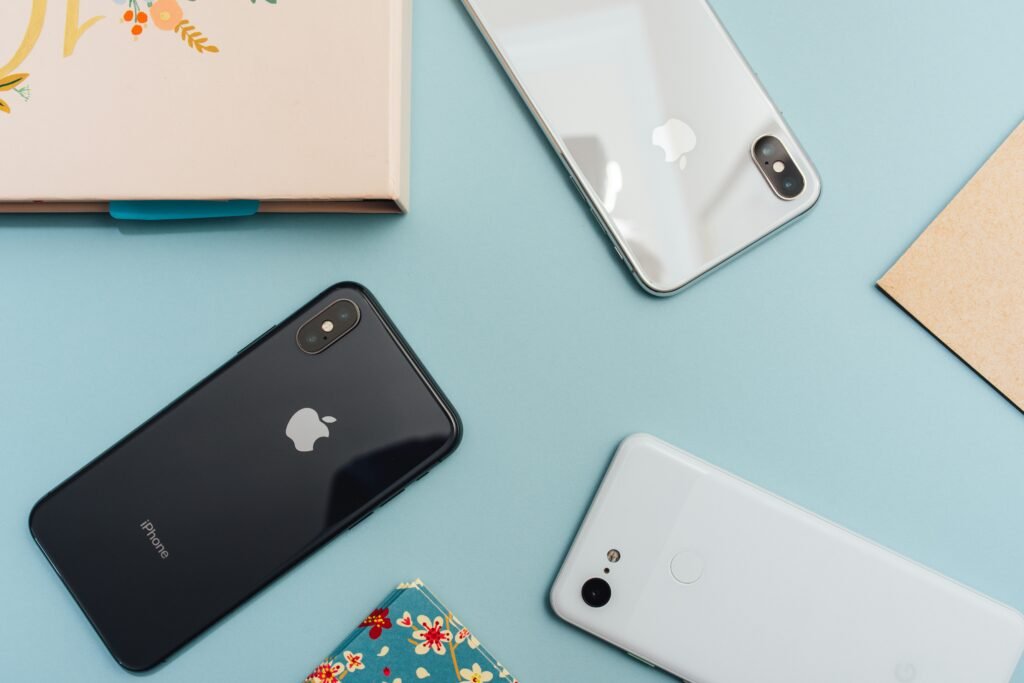 Premium smartphone and technology workspace representing Apple innovation