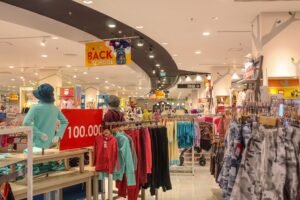 Back-to-school clothing displays in a department store