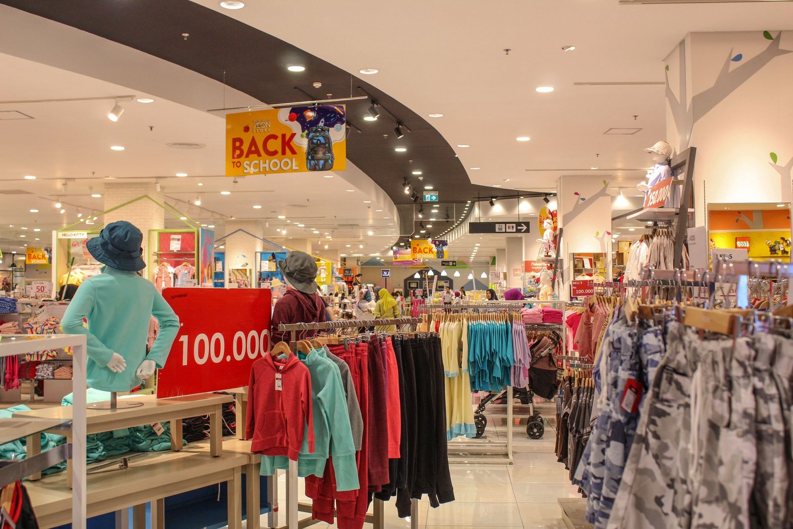 Back-to-school clothing displays in a department store
