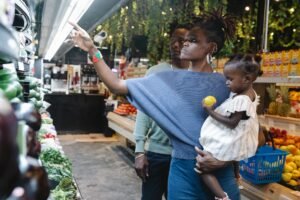 Family choosing fresh produce during a grocery shopping trip
