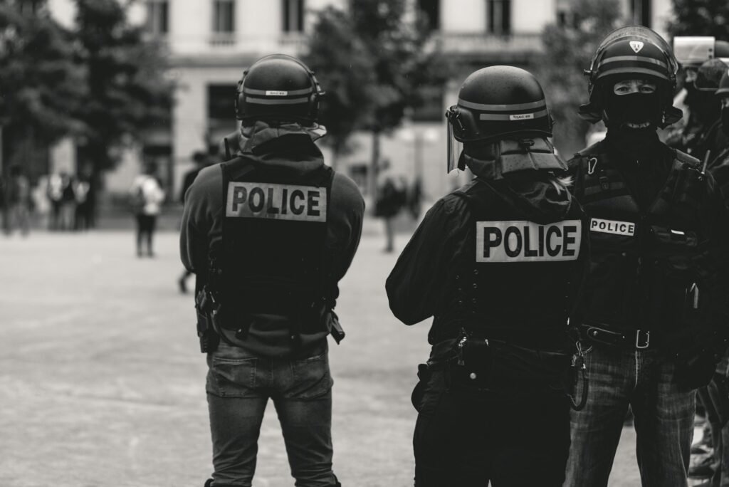 Police officers in protective equipment during a public safety operation