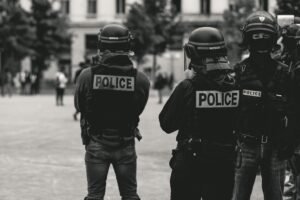 Police officers in protective equipment during a public safety operation