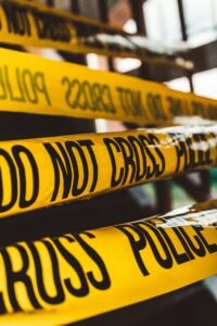 Police crime scene tape marking a restricted investigation area