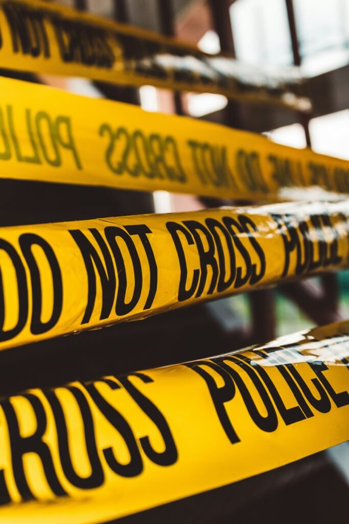 Police crime scene tape marking a restricted investigation area