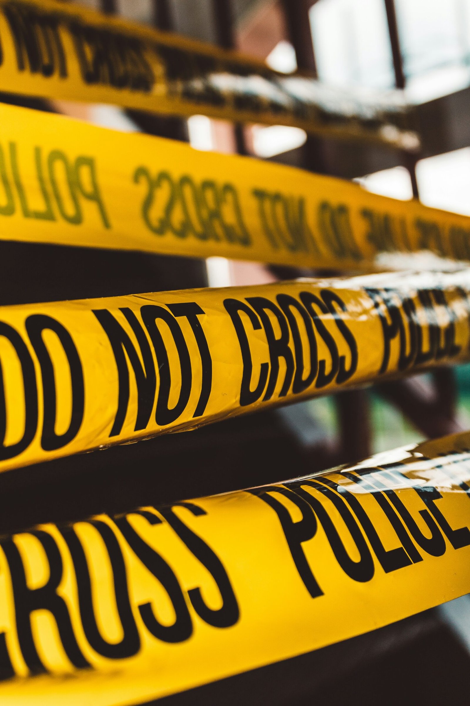 Police crime scene tape marking a restricted investigation area