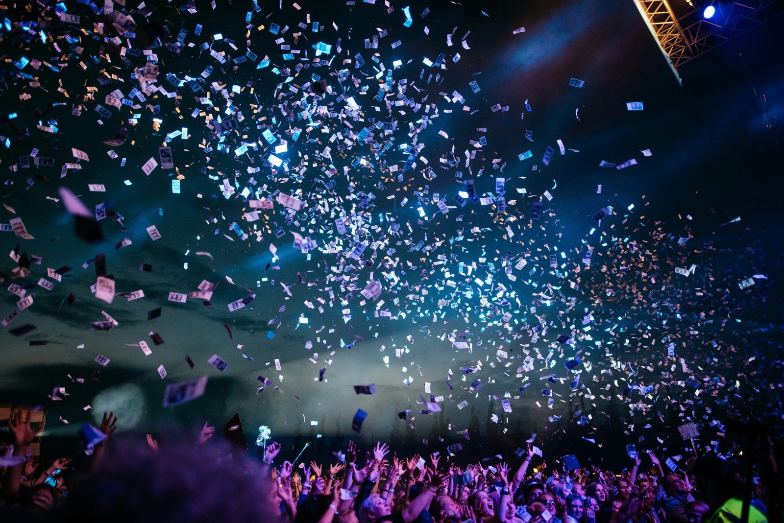 Crowd and stage lights representing Hollywood film events and entertainment industry activity