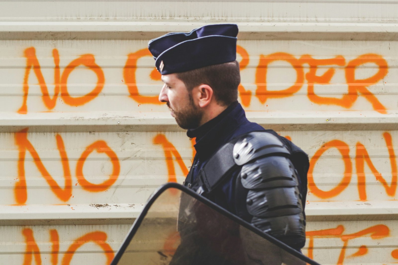 Police officer in protective equipment during a public safety operation