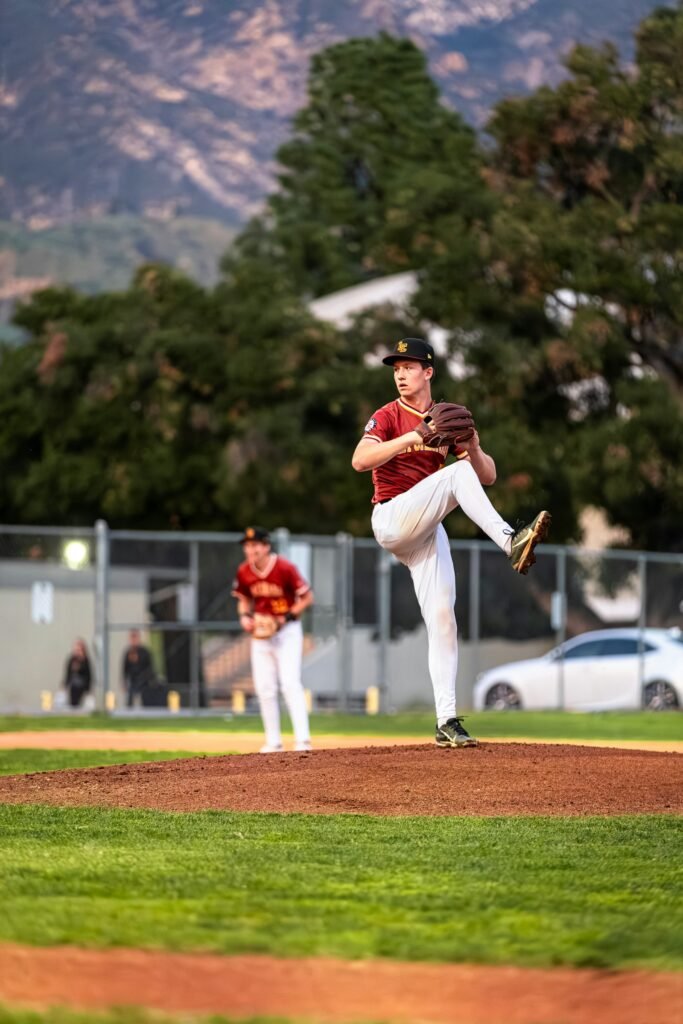 Baseball pitcher preparing to throw from the mound