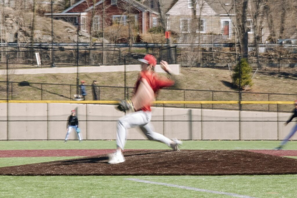 Baseball pitcher throwing from the mound