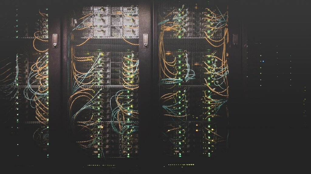 Data center server racks representing artificial intelligence infrastructure demand