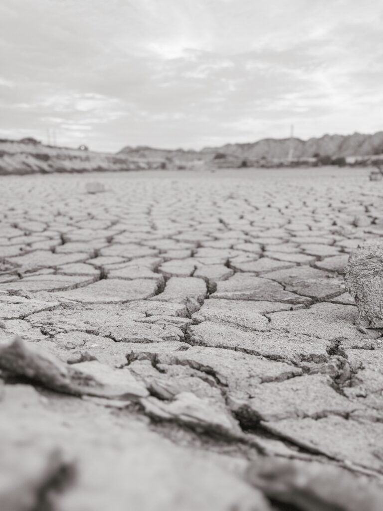 Cracked dry earth illustrating global warming, drought and climate risk