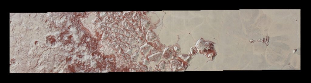 NASA New Horizons image of Pluto showing the icy Sputnik Planitia region and surrounding terrain